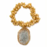 COLLAR DE MESA GOTA MARFIL